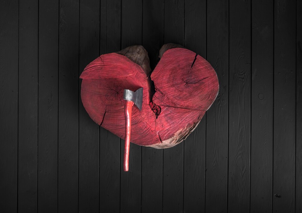 stuck-ax-wooden-heart_379858-455.jpg